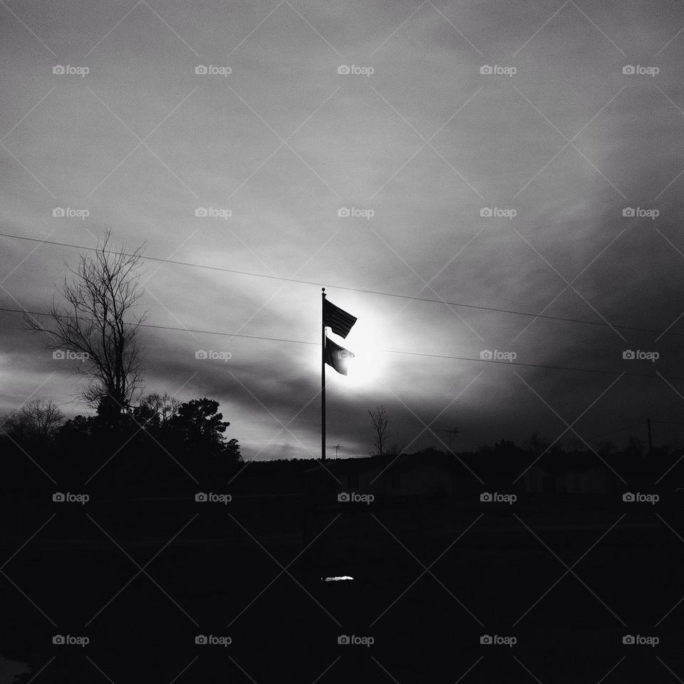 American flag in the sun