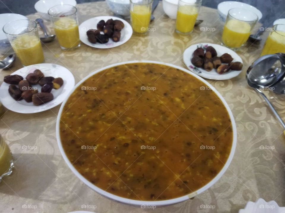 Moroccan table in Ramadan month:  Soup. Date and eggs.