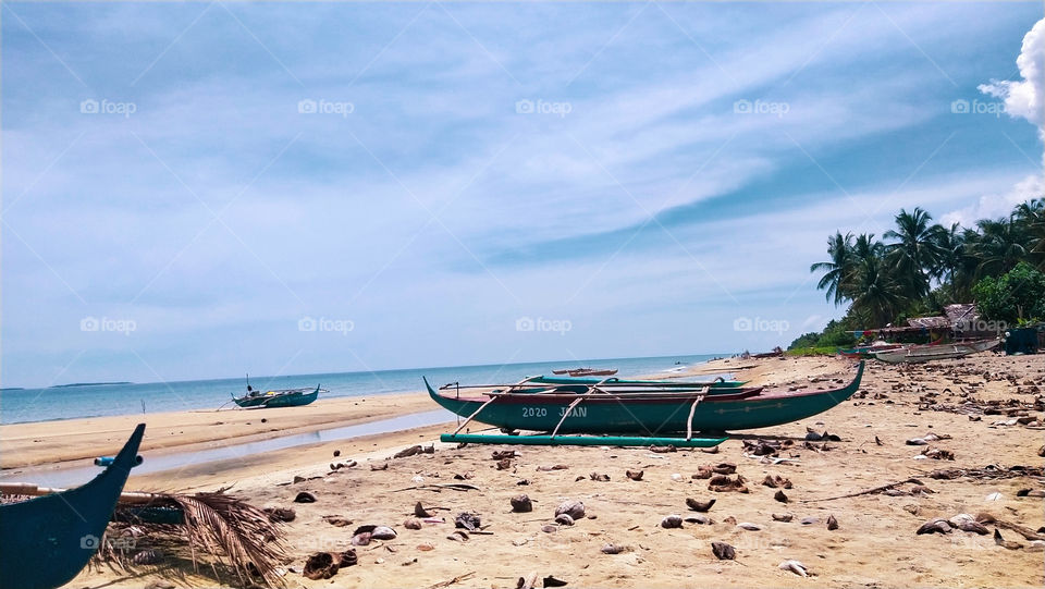 two boats in a seashore