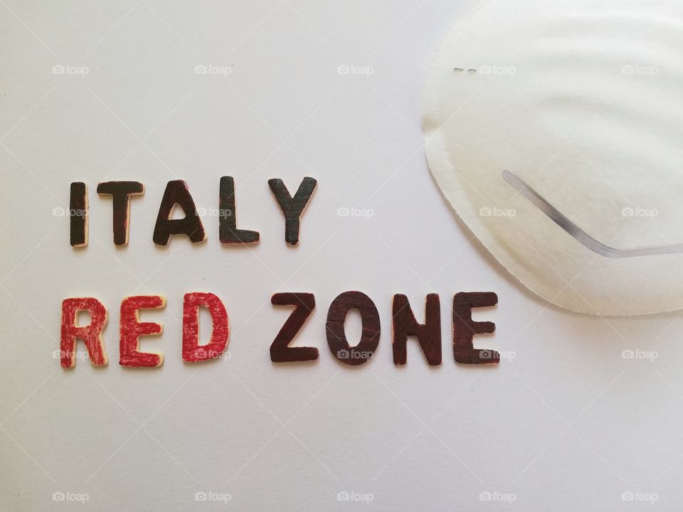 Written :"Italy Red zone" and medical mask