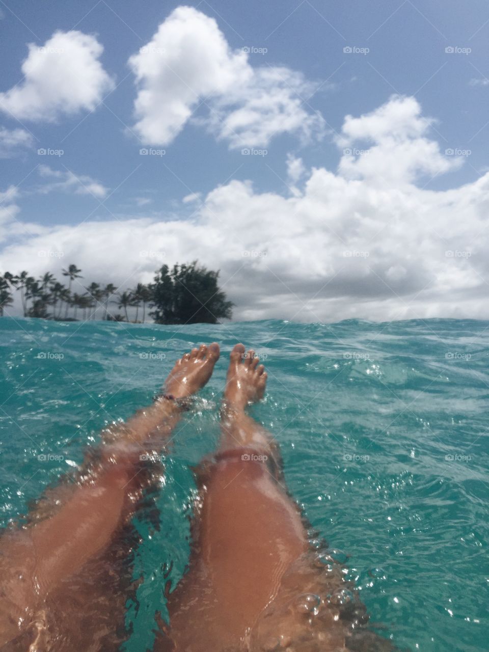 Relaxing and floating in the ocean.