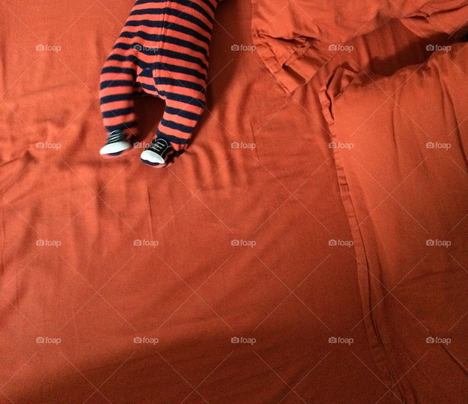 Where's baby?. Oddly, the baby matched the sheets that day. Made for a cute play on Where's Waldo. 