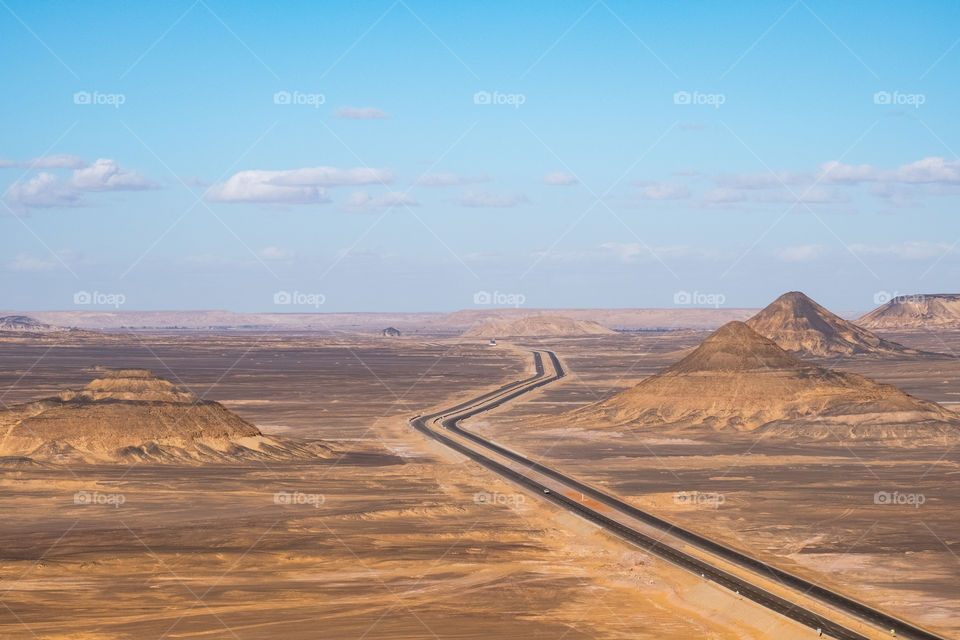 Drive on the long road along beauty land scape