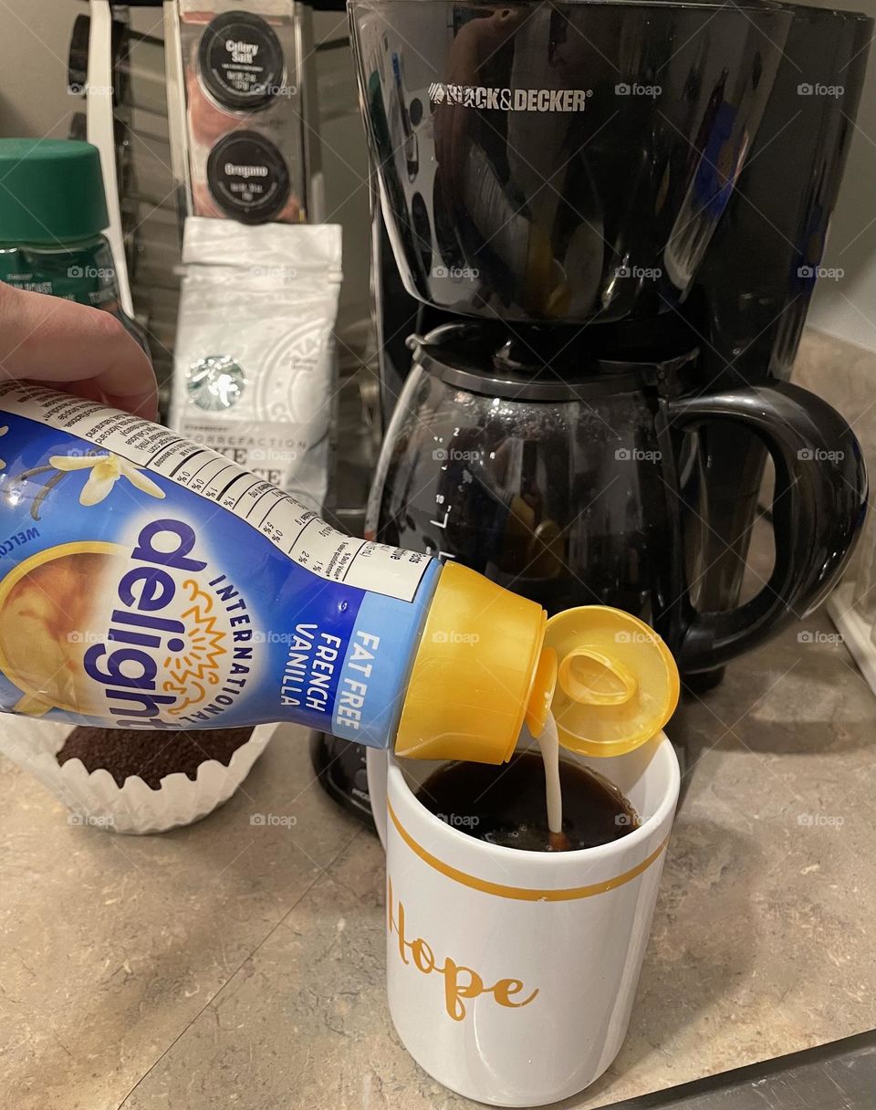 My favorite and only vice, cold or hot coffee! Making my Starbucks coffee, with a splash of French Vanilla Fat free International Delight cream….mmmmgood