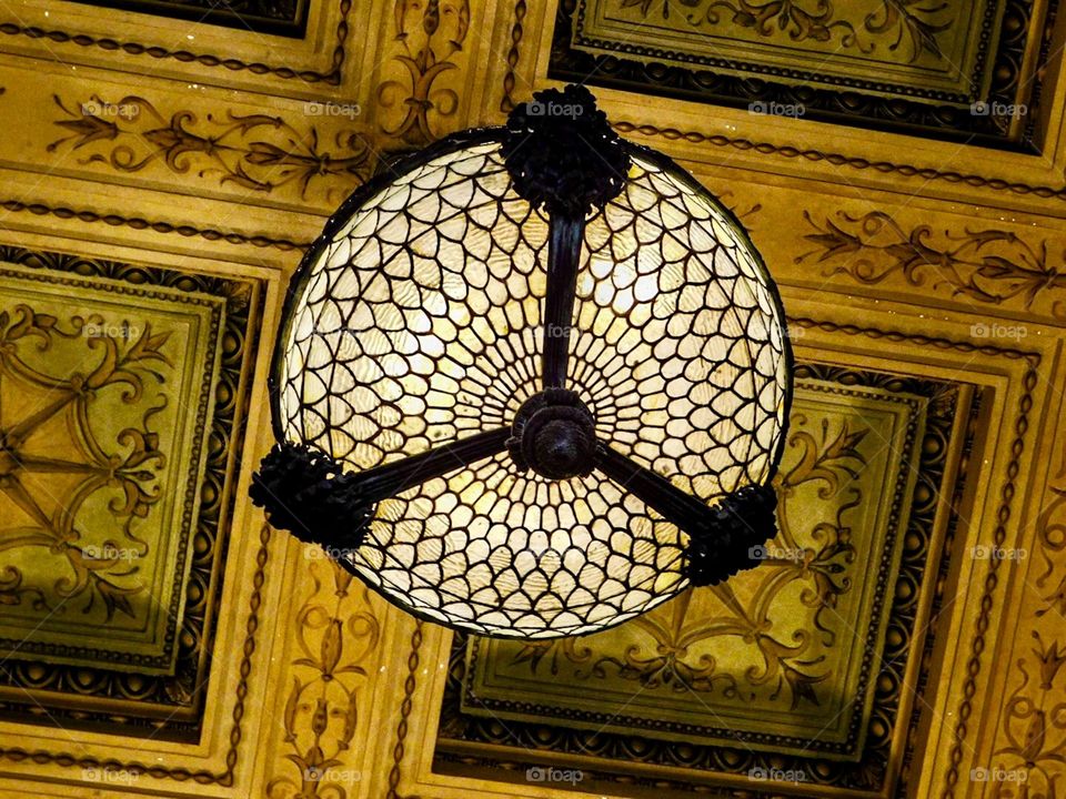 Light and ornate ceiling in a Chicago building 
