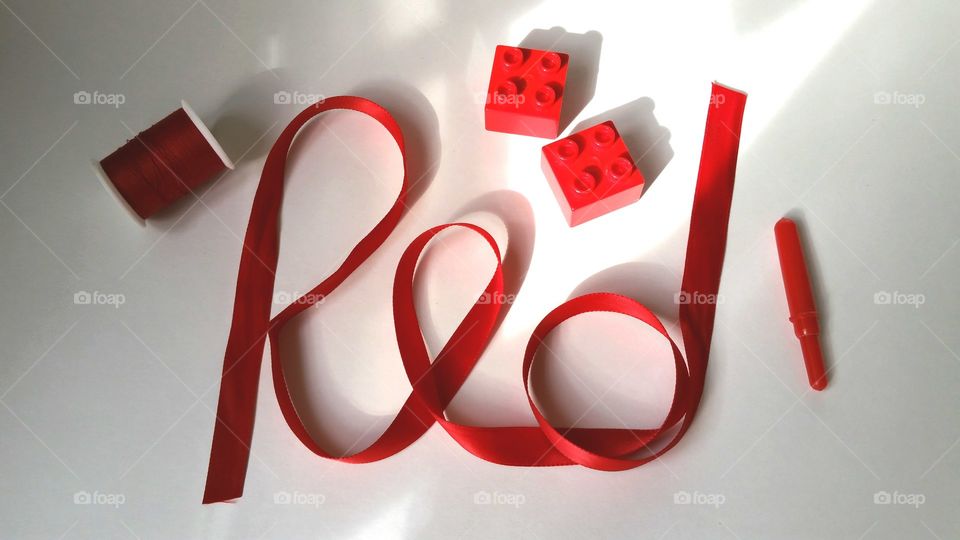 Word Red with red objects
