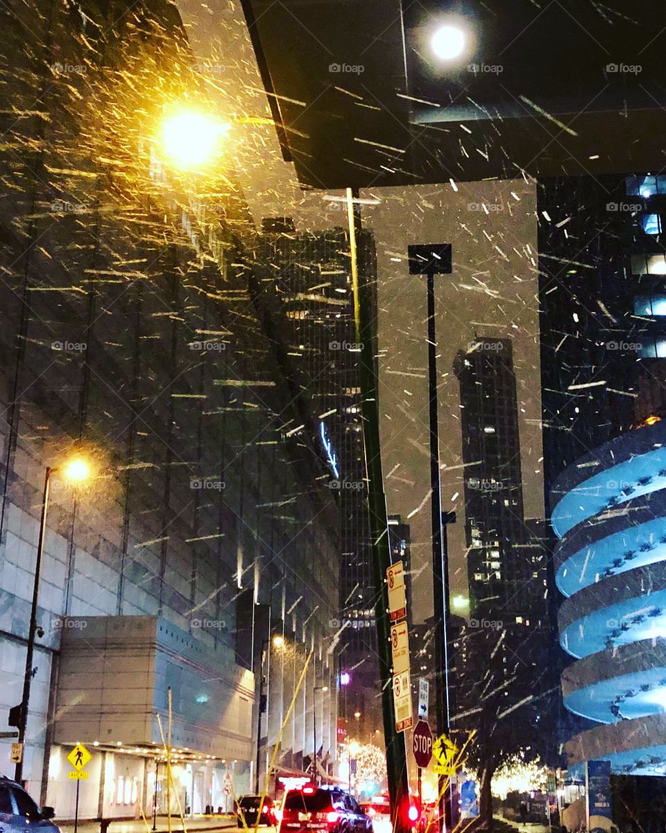 Snow fall under lamp light