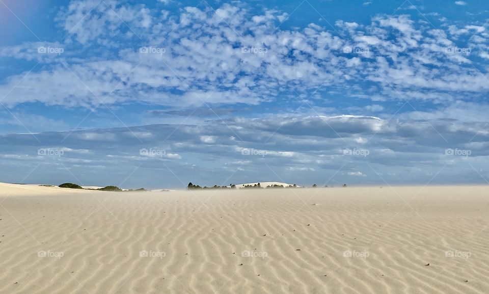 White dunes and white clouds 