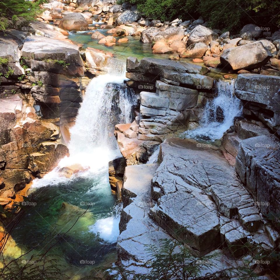 Twin Falls Cascade over rocks on a hot Summer day 