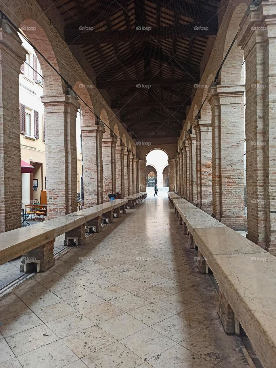 Silhouette of a man at the end of the tunnel