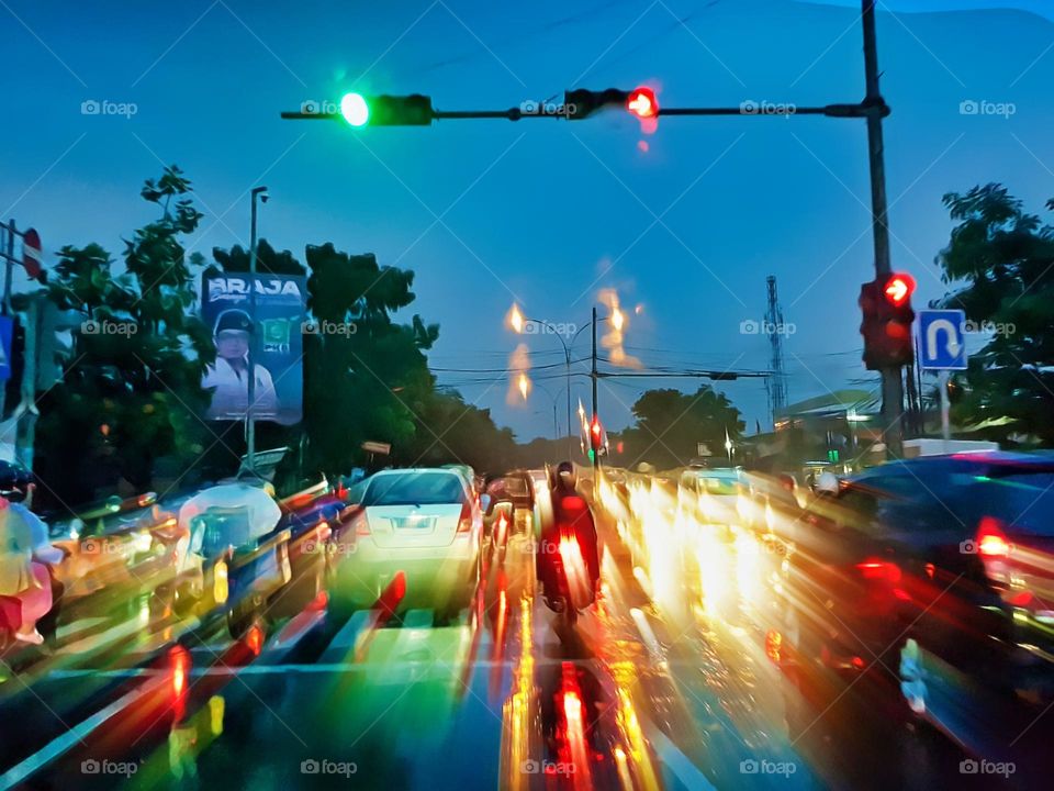 Highway view of heavy rain, night rain, slippeery road, traffic jam, heavy reflecting off road surface, night view of the city, beautiful outdoor, highway intersection light, traffic sign, motorcycle