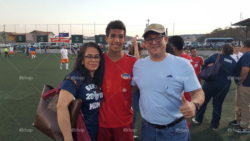 celebrating the final with my son and wife
