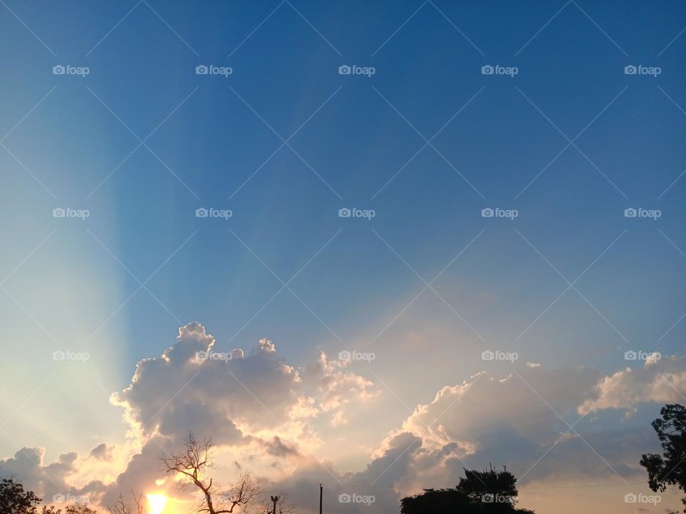 beautiful sun lighting clouds in the sky