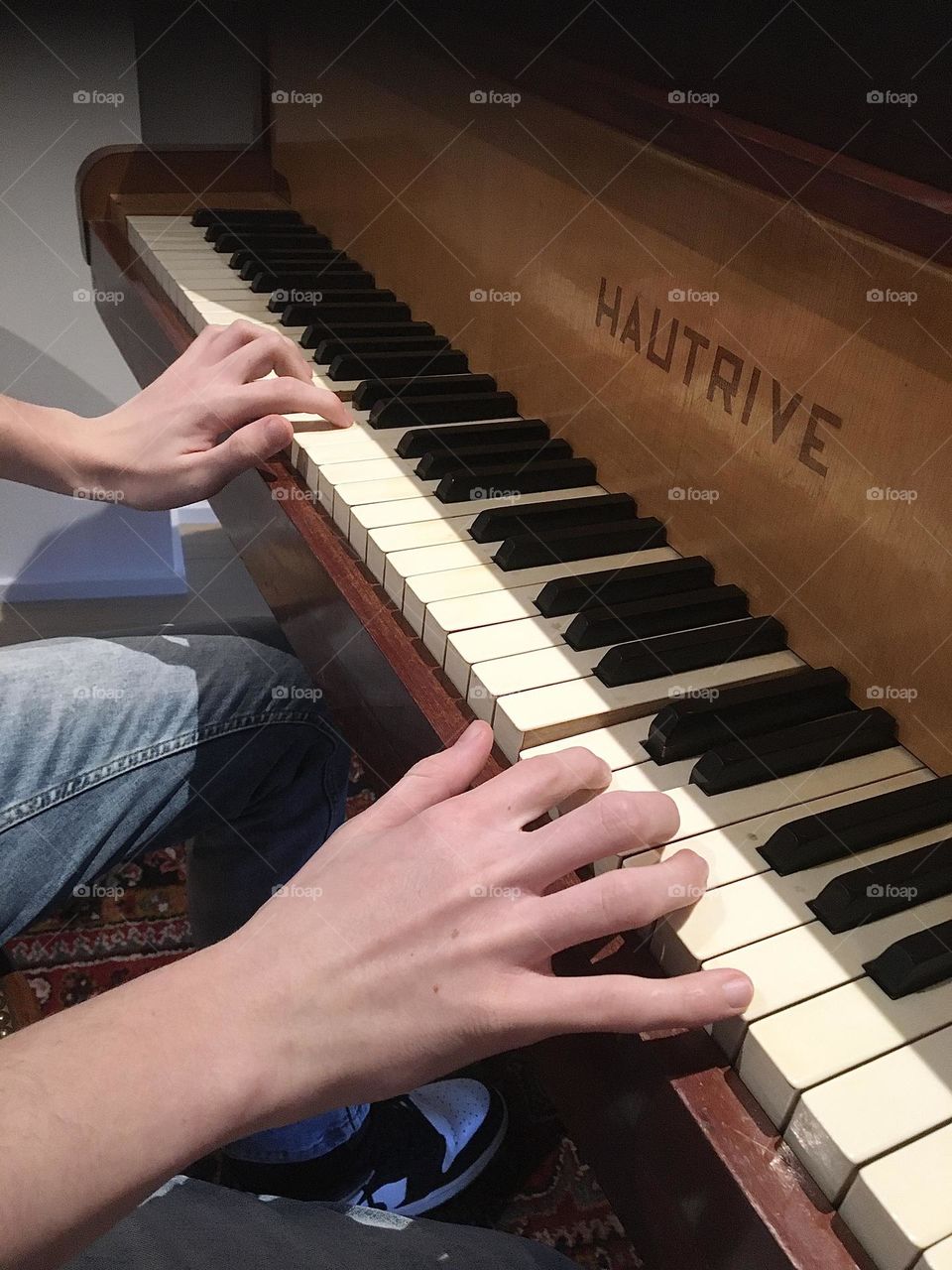 My son playing the piano