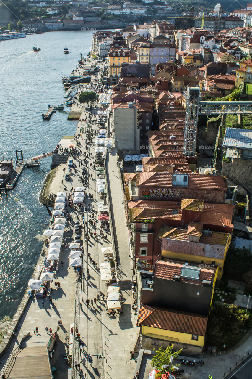 The view downwards to Porto and the Rio Douro from above on the bridge