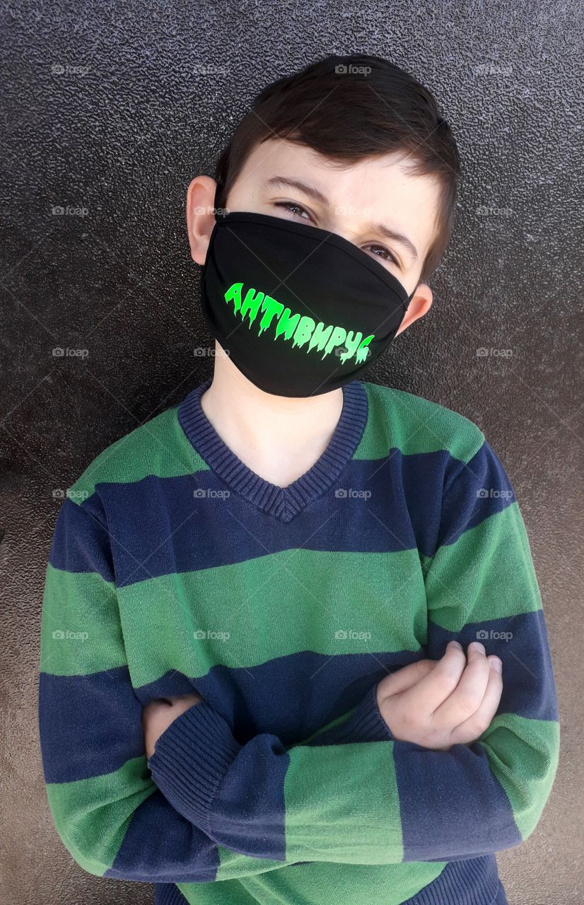 boy with mask on his face