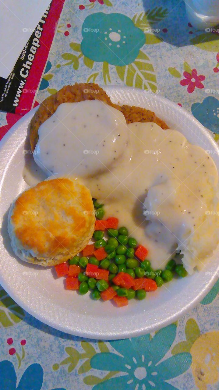 Mmmmmmmmmm country fried steak with sausage gravy, biscuit and veggies!!