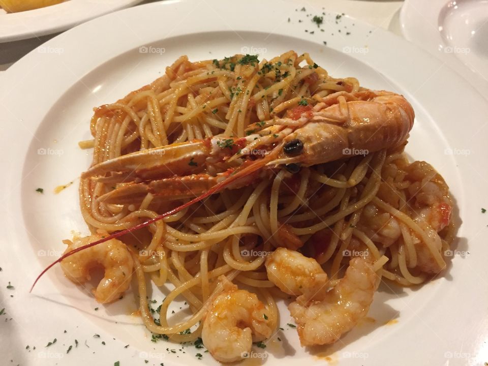 Seafood spaghetti with a face in Venice, Italy 
