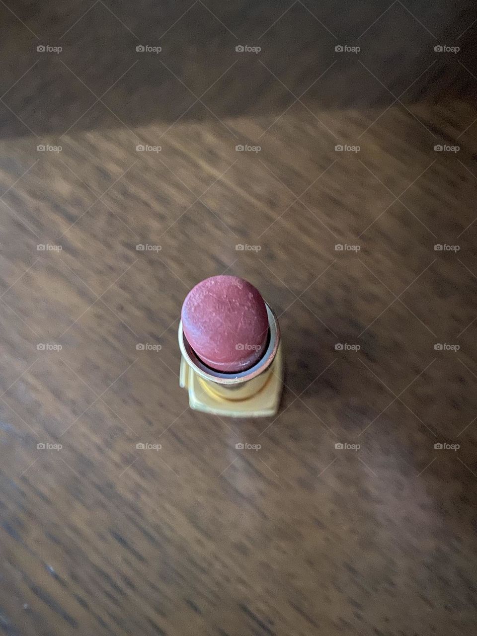 Pink lipstick on the table