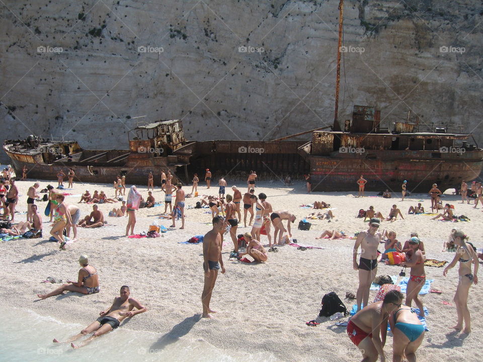 Navagio beach crowded by tourists