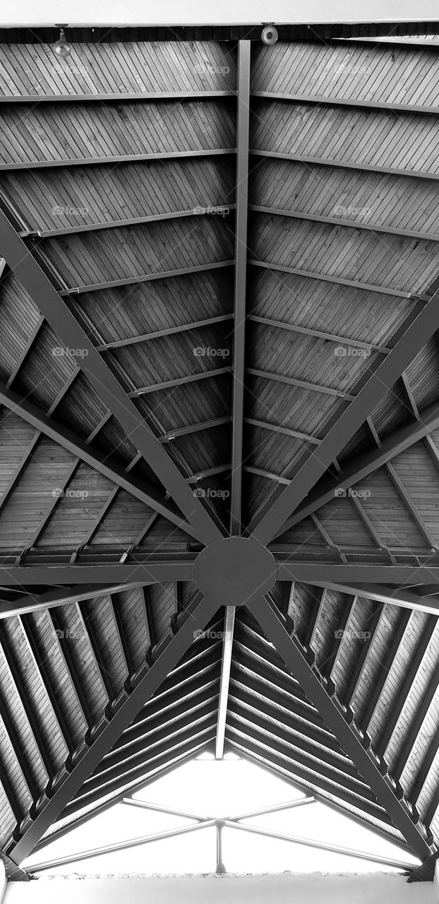 ceiling design in metal and wood, star shape