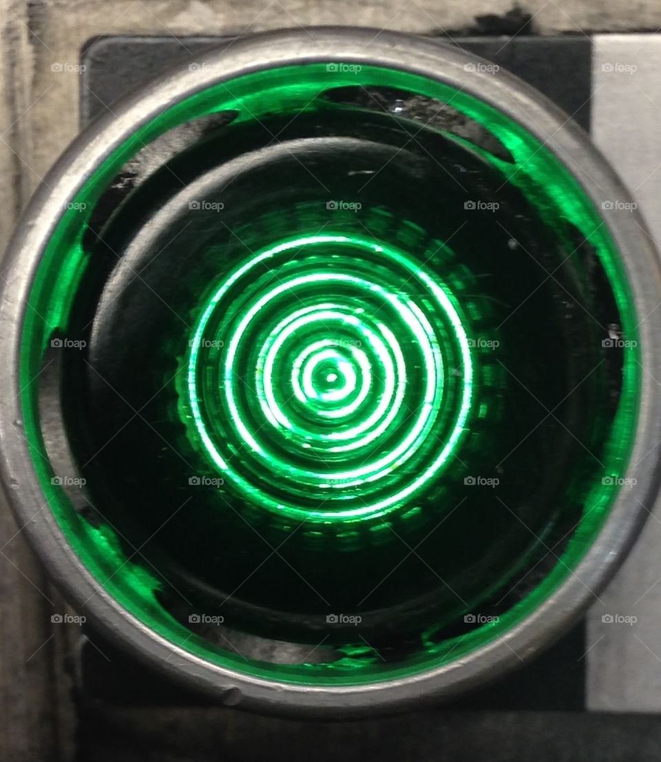 Green start button, light, control panel 