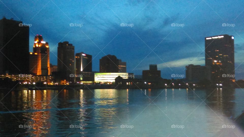 Night view of the city by the river.