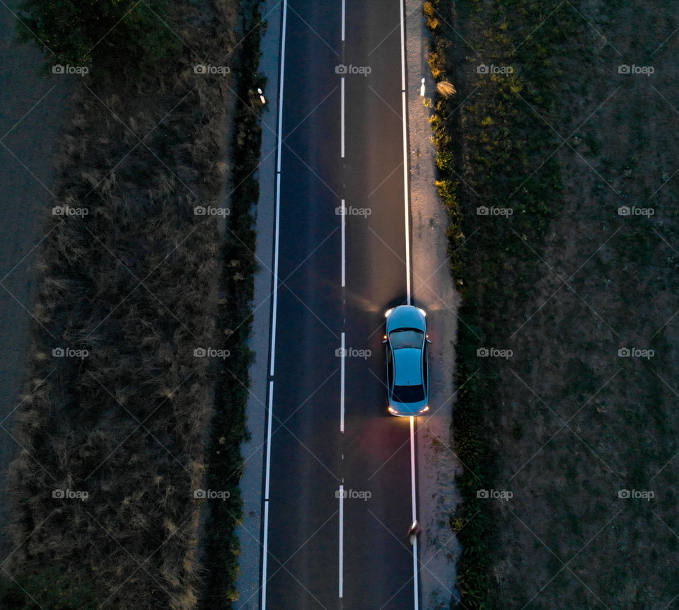 Car parked on a highway at night