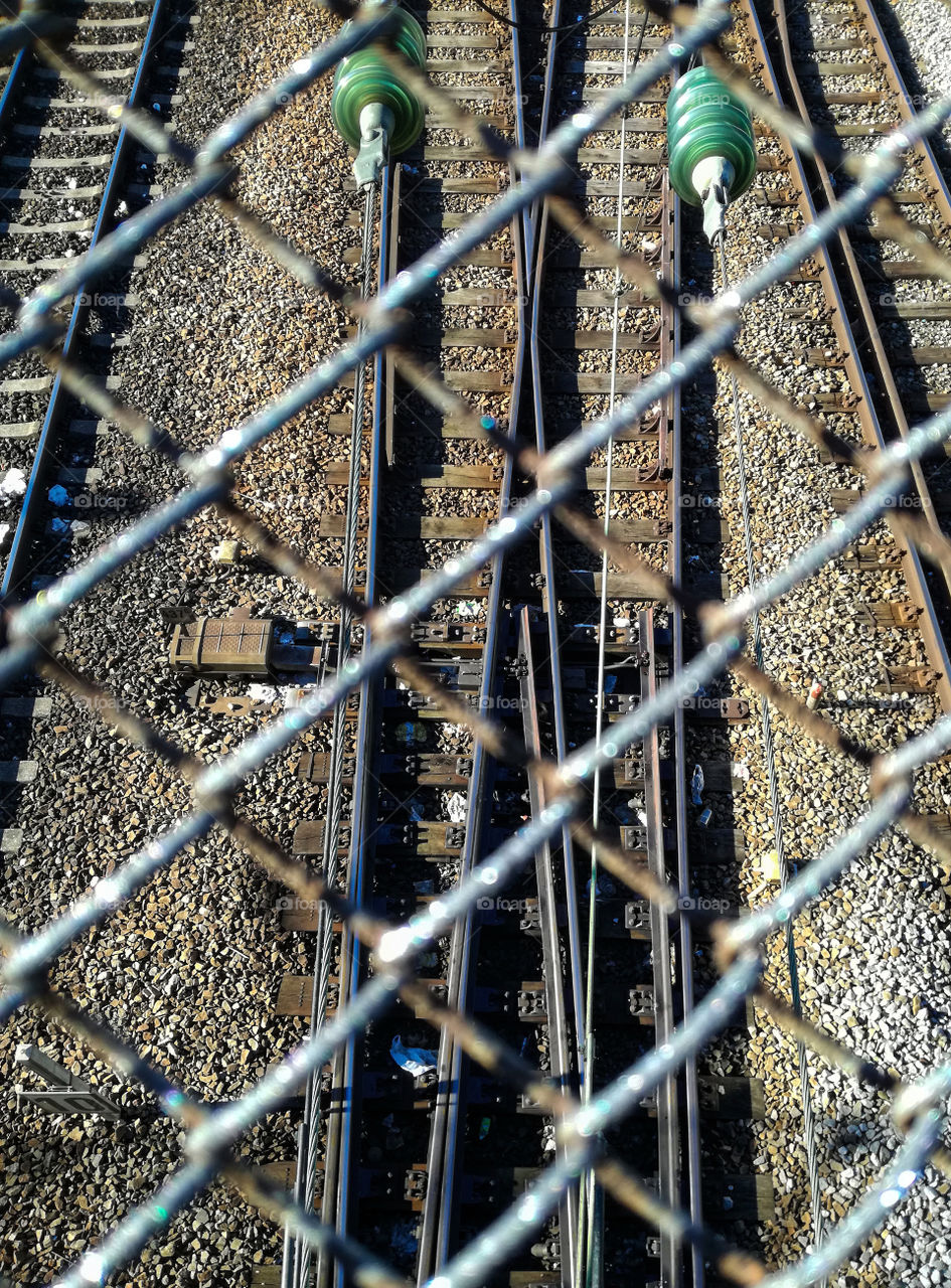 rails behind mesh wire