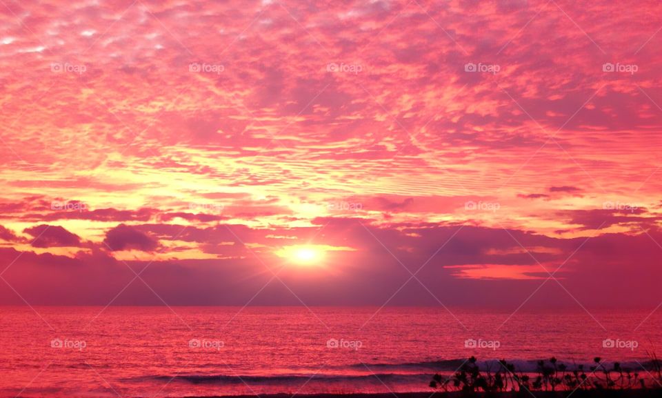 Red sky at night a sailors delight- Gold and red ocean sunset.