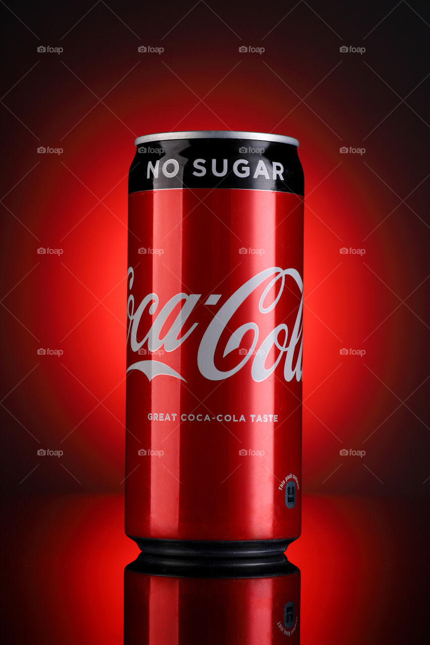 Coca-Cola can on red background