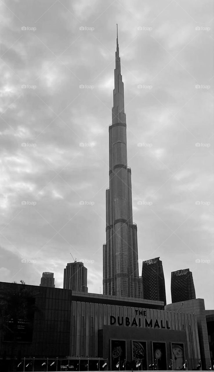 Burj Dubai among the clouds in black and white