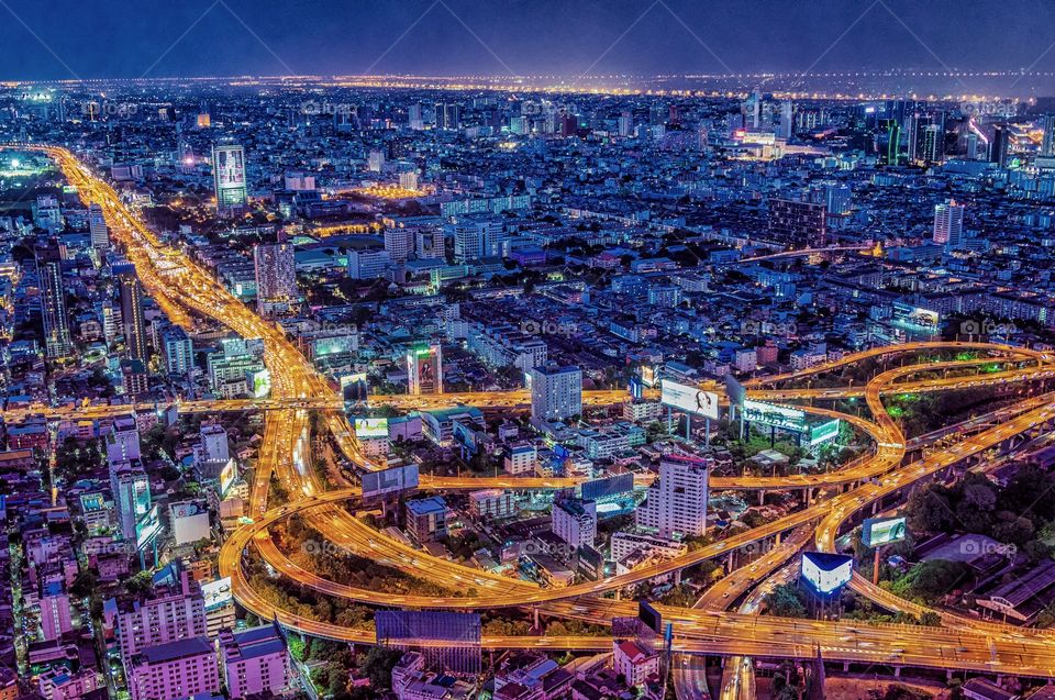 Beautiful night scene of vehicle light on express way in Bangkok city Thailand