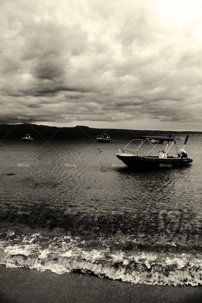 boats sea cloudy island by pablogarcia