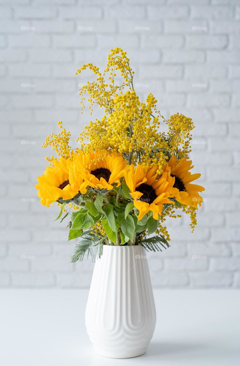 beautiful yellow flowers in the vase