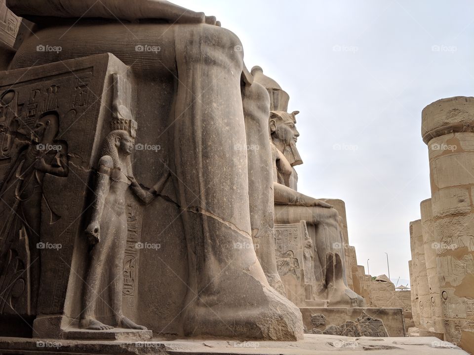 Colossal statues of the Pharoahs adorn the entrance to the Temple of Luxor in Luxor, Egypt