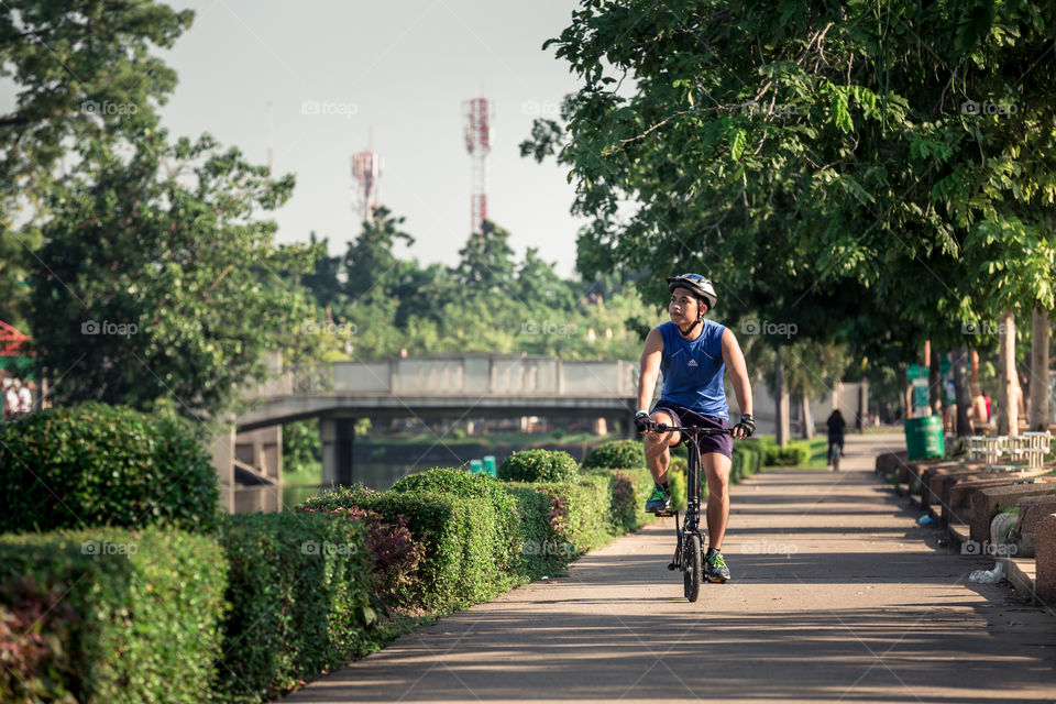 Man riding bike in the park 