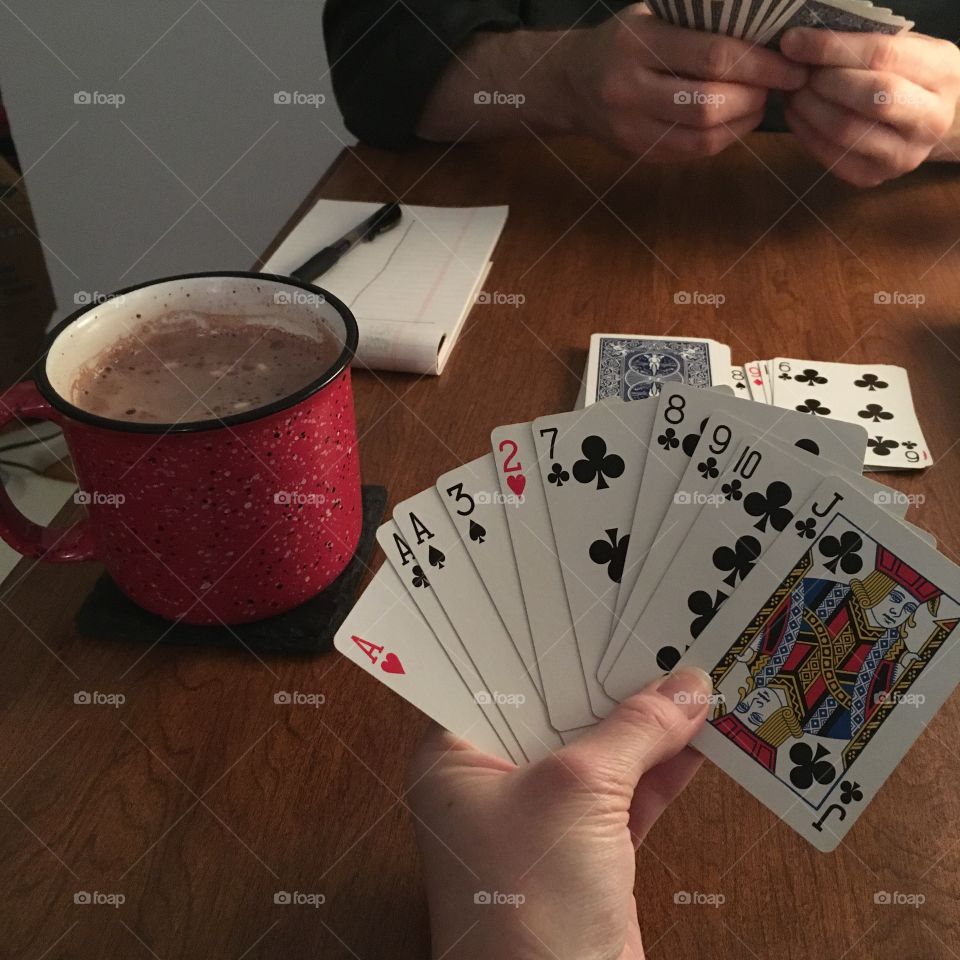 Hot chocolate and gin rummy on a cold winter night 