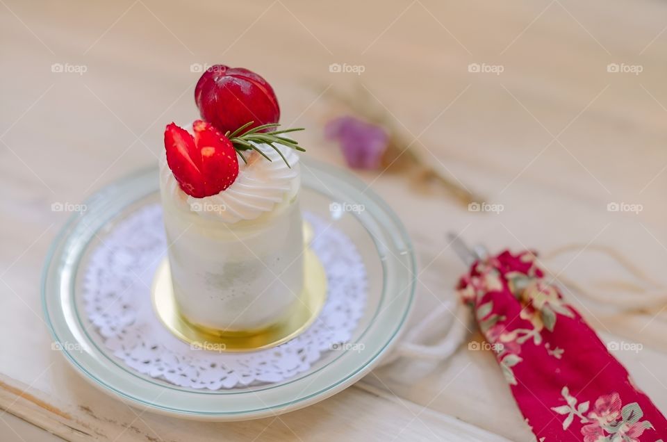 small fresh cream cake with strawberry