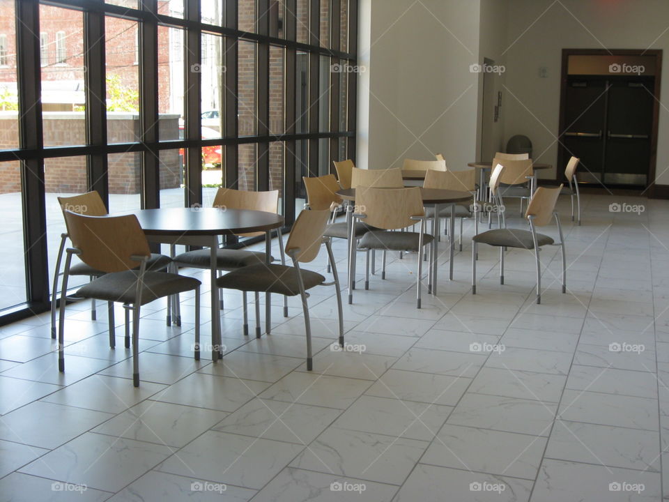 The inside of building, a section for students to lounge and study. Good lighting and a very sophisticated atmosphere. 