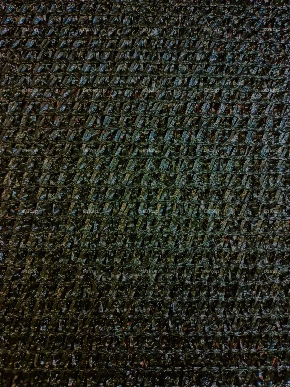 Close-up of black plastic on the whole frame