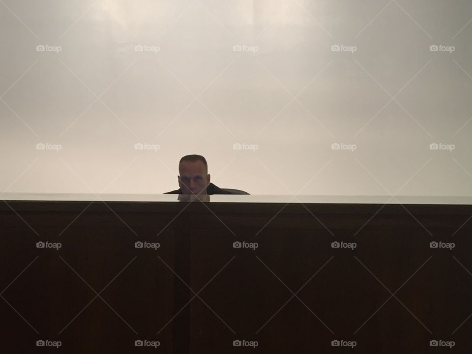 Man behind desk. Man behind desk