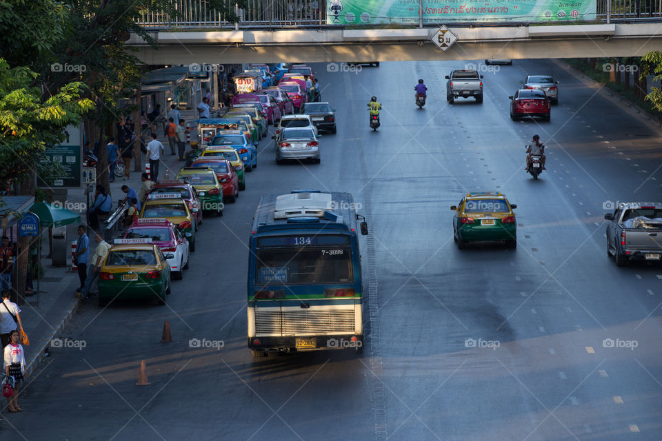 Public road with bus at evening time in Bangkok Thailand 