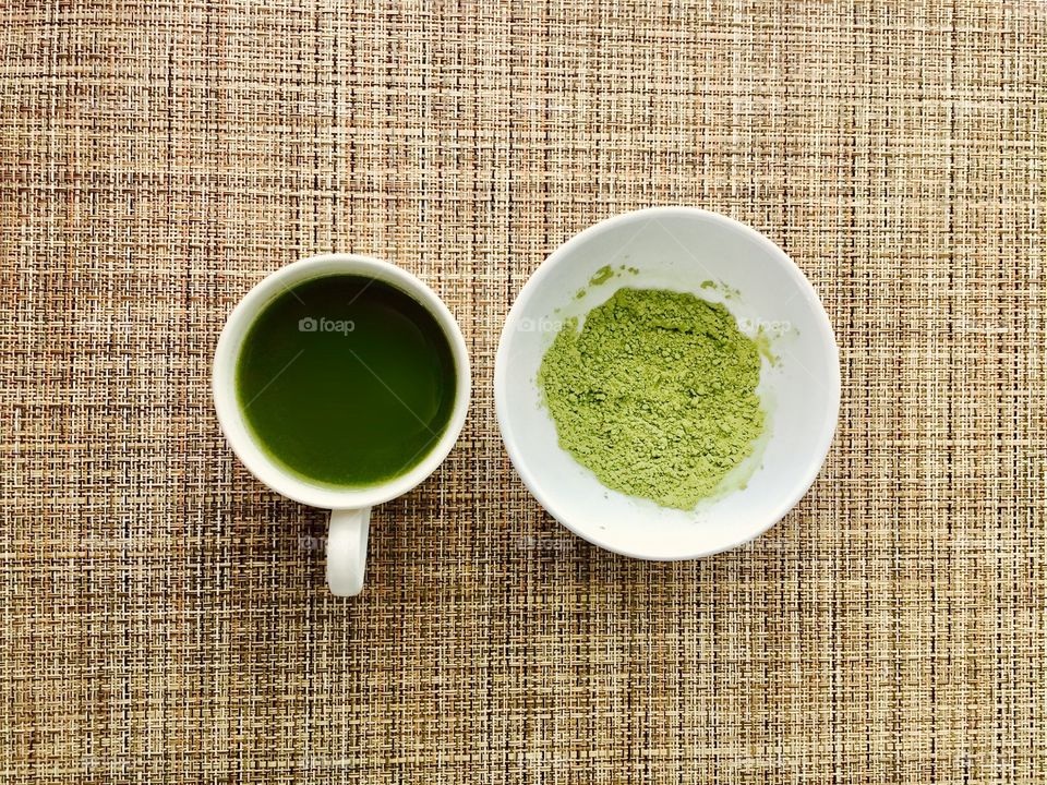 Matcha tea on bamboo surface