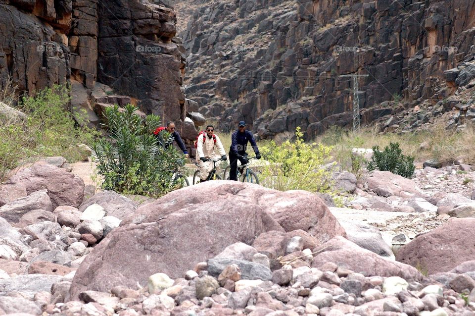 Cycling trip through the mountain road on a hard track