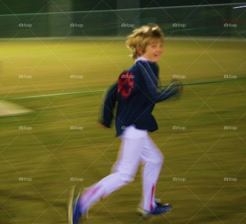 My son playing baseball 