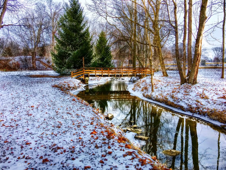 Scenic view of creek during winter