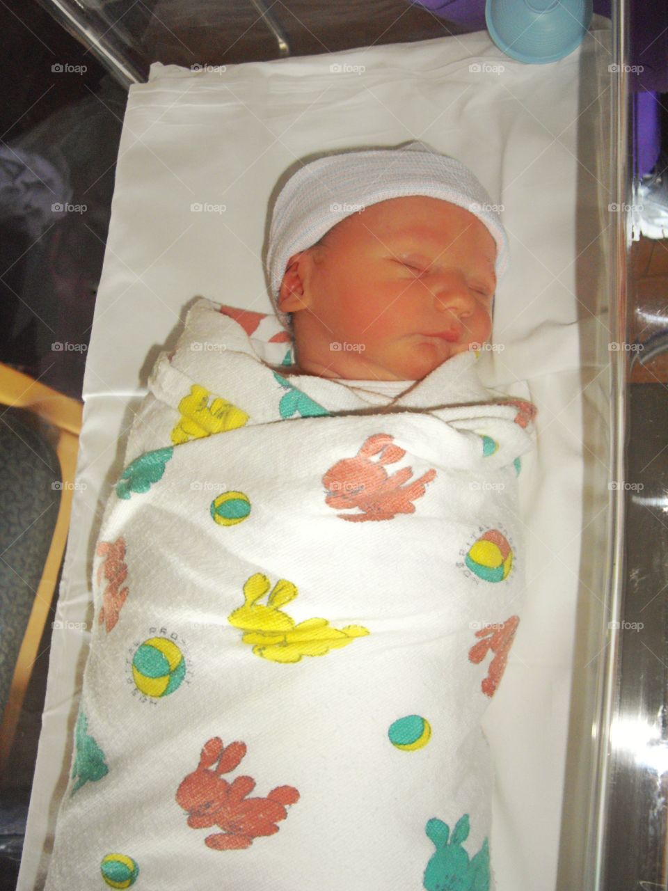 Newborn Baby In Maternity Ward
