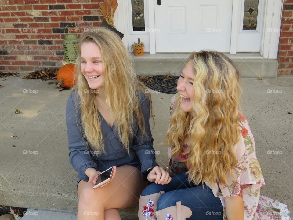 Girl cousins sharing a laugh