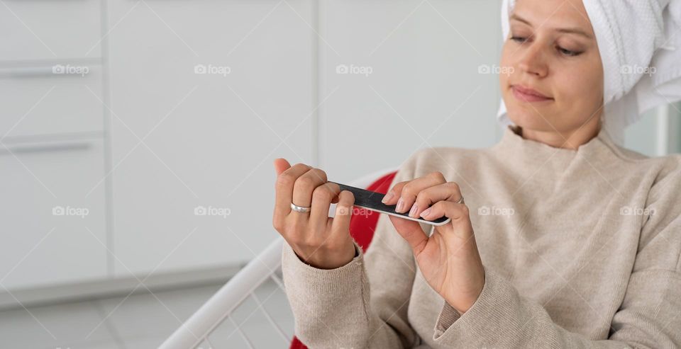 woman hand holding beauty products